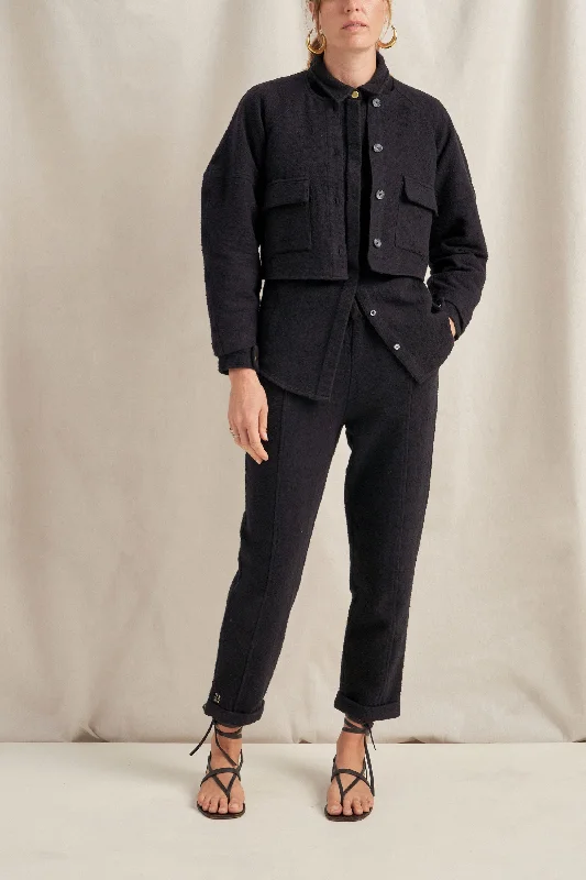 Sheer men's thongs for a provocative appearanceNomos Cropped Black Boucle Jacket